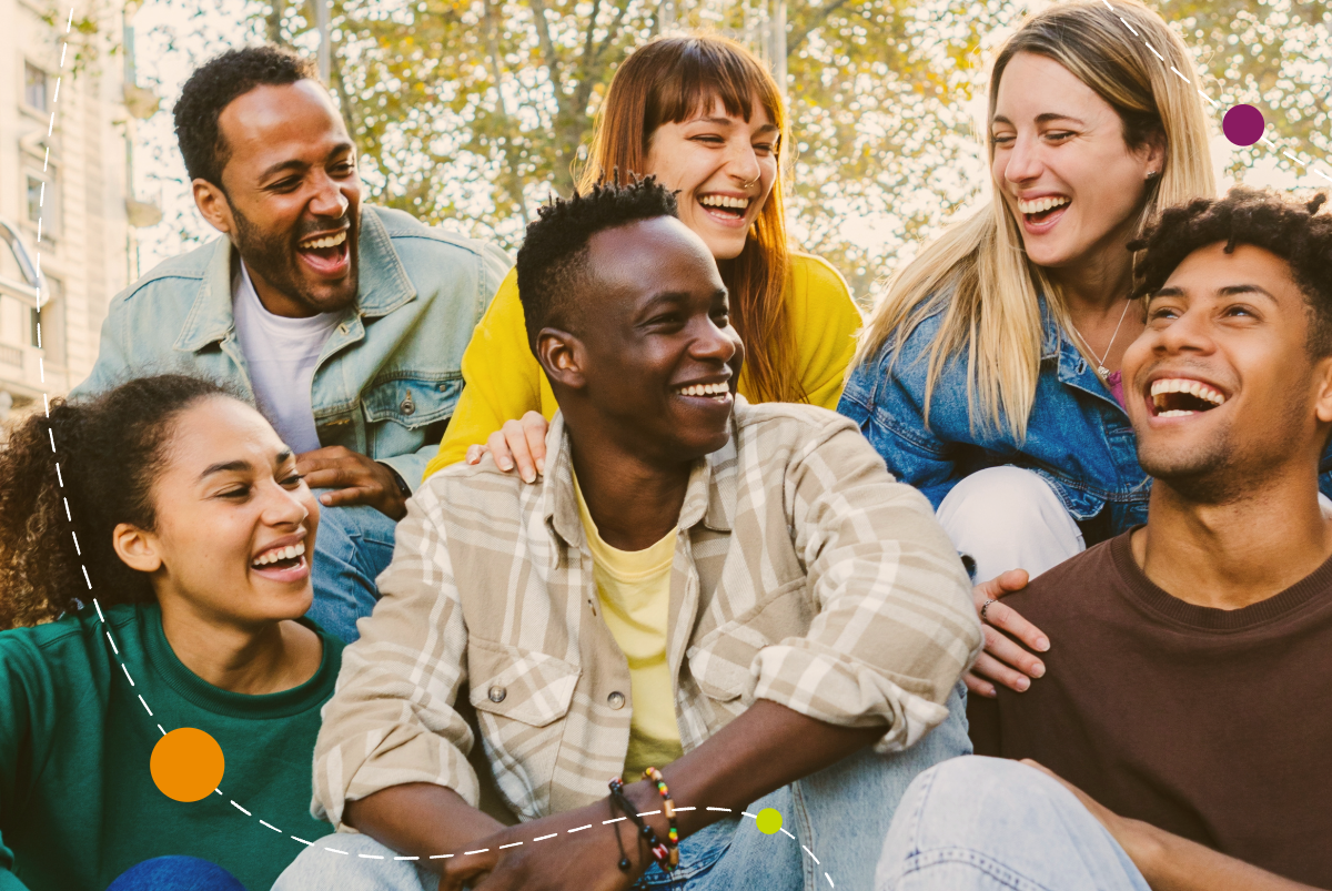group of friends laughing in urban setting